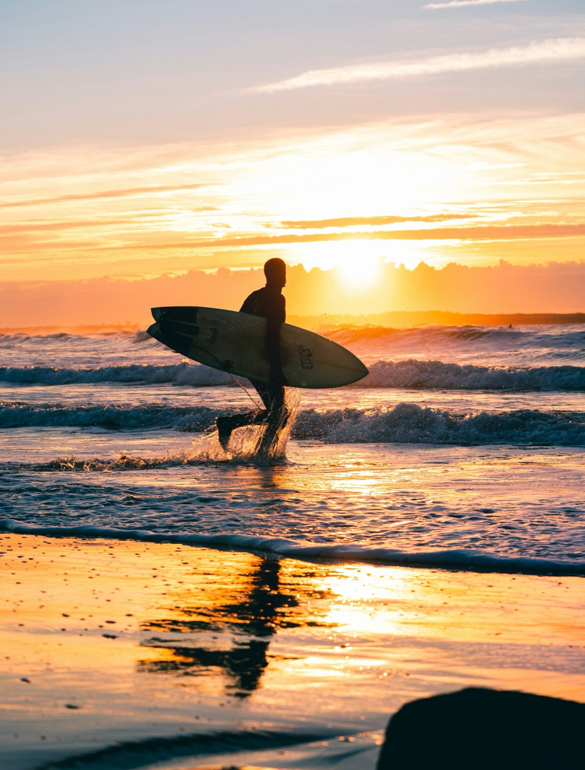 Surfer at sunset